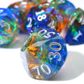 blue and orange resin percentile die on a white background
