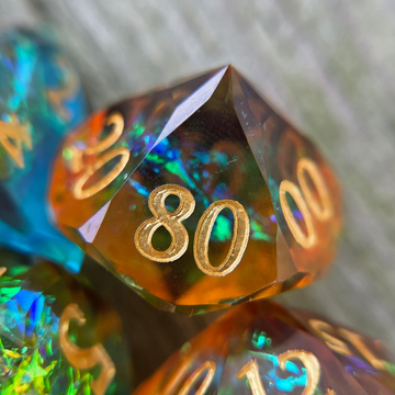 an orange percentile die with holographic foils