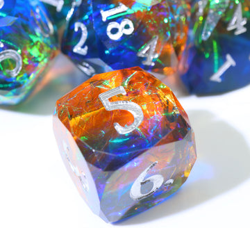 blue and orange polyhedral six-sided die