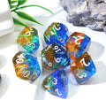 a full set of colorful dnd gaming dice with a small plant in the background