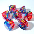 Set of colorful polyhedral dice with numbers on a white background