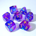 Set of purple polyhedral dice with gold numbers on a white background