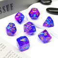 Set of purple polyhedral dice sitting on a tabletop