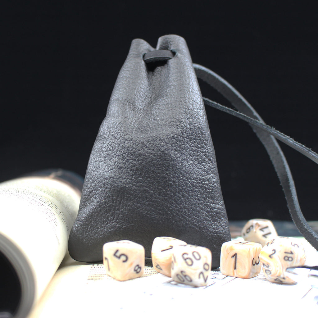 profile shot of leather dice bag